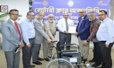Rotary Club donates 12 wheelchairs to Biman
